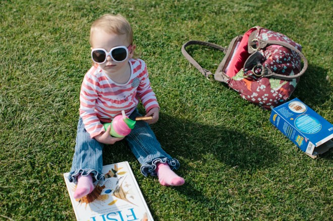 Flying a kite with the kids on a sunny Sunday afternoon